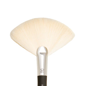 OMNIA® Large, fan-shaped brush designed for soft, diffused application, making it ideal for lightly bronzing the face, adding subtle contour, or sweeping away excess powder. The ultra-soft filaments gently glide over the skin, making it perfect for quick, effortless finishing touches.